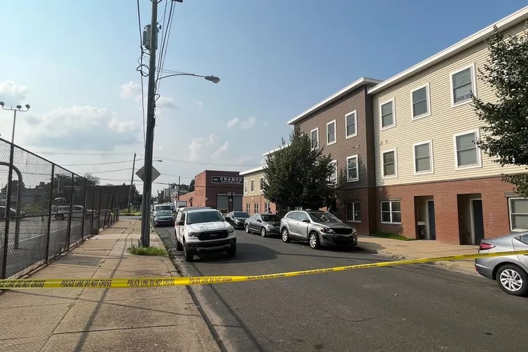 Crime scene tape at a shooting that occurred during an eviction on the 2200 block of East Auburn Street in Philadelphia on Tuesday, July 18, 2023.
