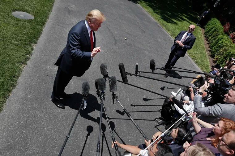 President Donald Trump speaks to members of the media on the South Lawn of the White House in Washington, Friday, May 24, 2019, before boarding Marine One for a short trip to Andrews Air Force Base, Md., and then on to Tokyo.