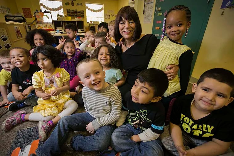 Kathy McHale, president of Special People in Northeast Inc. (SPIN), with a group of 3- and 4-year-olds. Since high school, McHale has been drawn to altruism and volunteering..