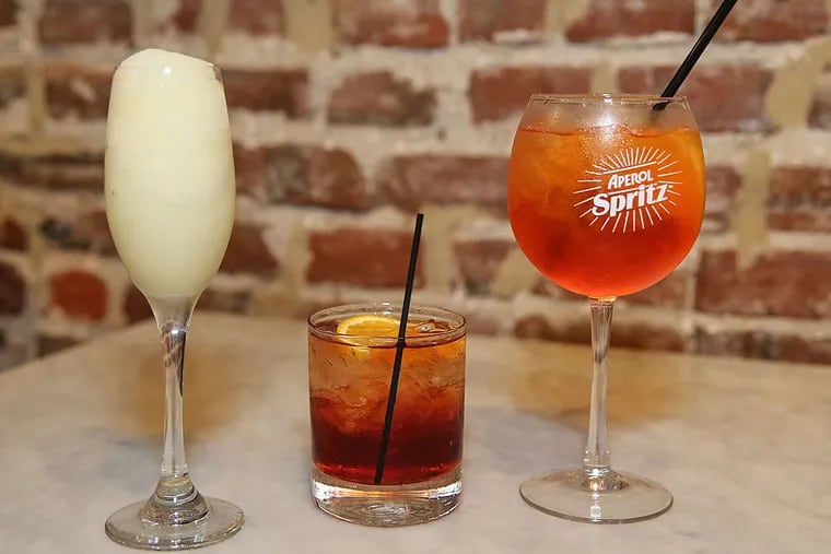 Low-alcohol summer drinks at Gran Caffe L'Aquila (from left): Sgroppino, Negroni, and Aperol Spritz.