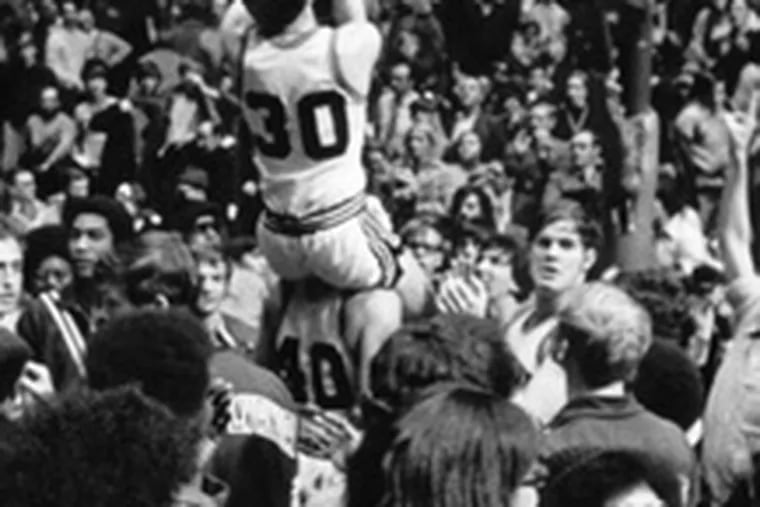 helped cut down the nets after Penn captured the Ivy League title in 1975.