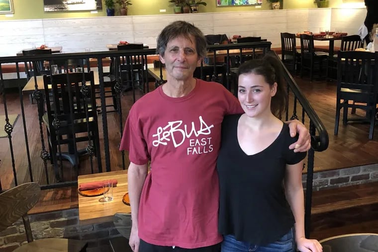 David Braverman and his daughter, Jamie, at Le Bus East Falls, which opened in February 2018 at Ridge and Midvale Avenues.