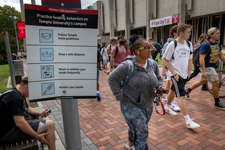 Temple University students make their way along Polett Walk in August.