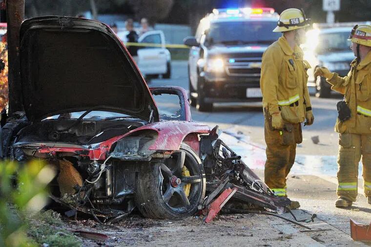 The wreckage of the 2005 Porsche Carrera GT that crashed in Valencia, Calif., and exploded in flames, killing actor Paul Walker and his friend Roger Rodas, the driver.