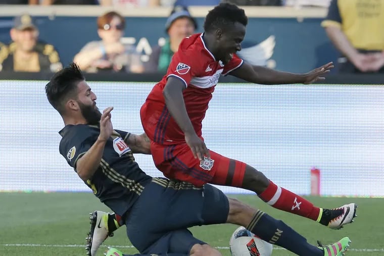 David Accam (right) had 14 goals and eight assists for the Chicago Fire in 2017.