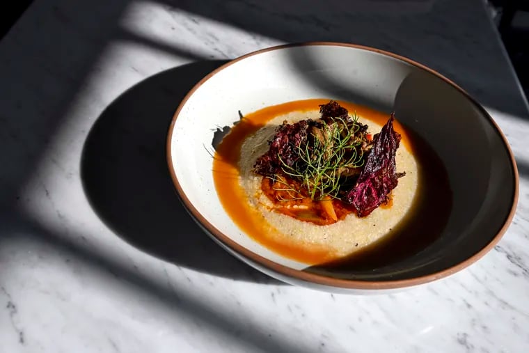 May 11, 2023: The Black Garlic Glazed Maitake with hickory king corn polenta with pepperonata, tomato brodo and stridolo as served at Ground Provisions, in Dilworthtown the  new country restaurant from Rich Landau and Kate Jacoby.