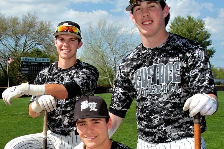 Bishop Eustace's slugging threesome: Chris Jones (left), who has hit 5 homers; Mike Krusinski (seated) who has 7, and Nick Browne, who has 8. ELIZABETH ROBERTSON / Staff Photographer