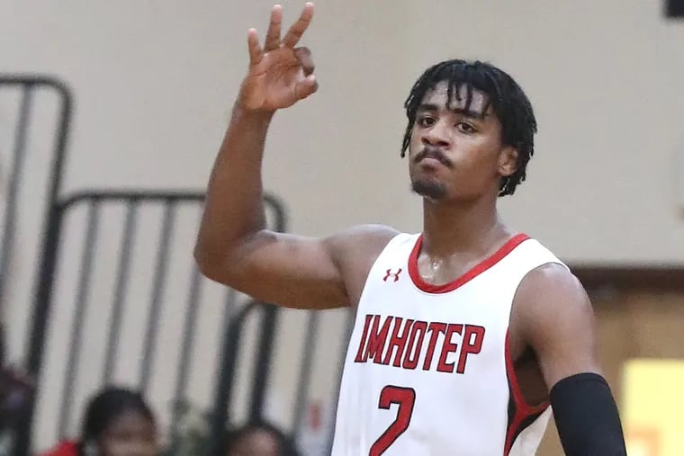 Imhotep Charter basketball standout Chereef Knox after making a 3-pointer against ML King on Dec. 13, 2018.   CHARLES FOX / Staff Photographer