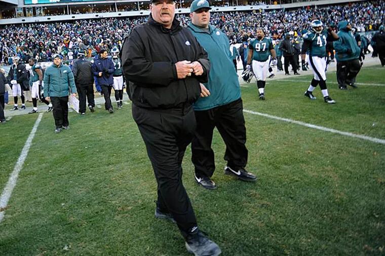 Philadelphia Eagles head coach Andy Reid walks across the field after the game. (Michael Perez/AP)