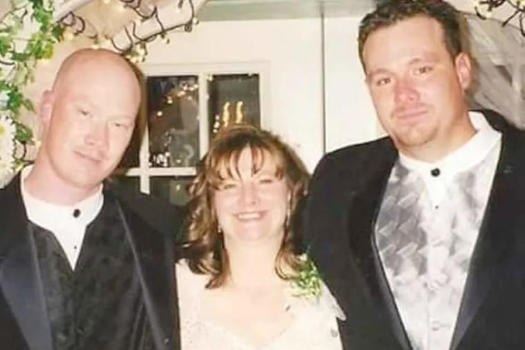 Karen Brady, seen with sons Jeremy (left) and Mike, will hold a vigil outside Curran-Fromhold Correctional Facility while Pope Francis visits there. Mike Brady died in 2011 as an inmate there.
