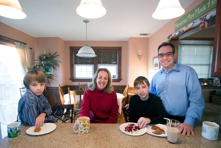 Jamie and Jack Fairchild are not letting their sons Luke (left), 10, and Aidan, 12, take the PARCC - the Partnership for Assessment of Readiness for College and Careers. ( DAVID SWANSON / Staff Photographer )