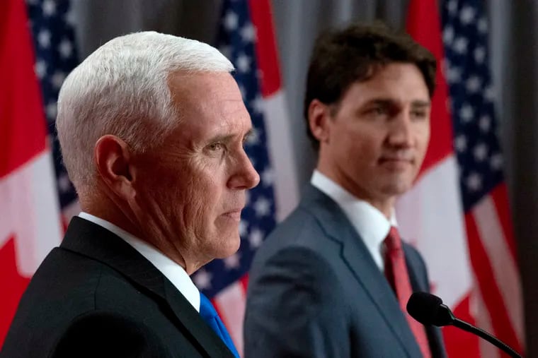 Canadian Prime Minister Justin Trudeau (right) and U.S. Vice President Mike Pence listen during a joint news conference in Ottawa, Thursday, May 30, 2019. (Adrian Wyld / The Canadian Press via AP)