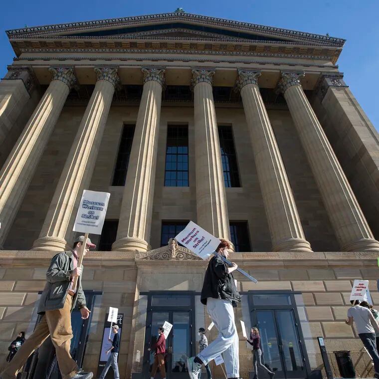 Philadelphia Museum of Art (PMA) workers are on the 13th day of their strike for a labor contract that provides fair and equitable wages and affordable health care.  They picket on the west side of the museum on Oct. 7, 2022.