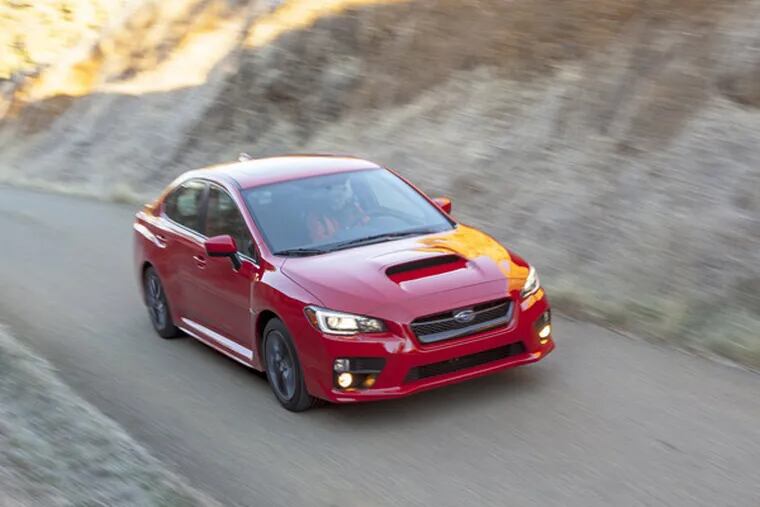 The 2015 Subaru WRX goes 0-to-60 in a little more than 5 seconds, according to Car and Driver. (Subaru/MCT)