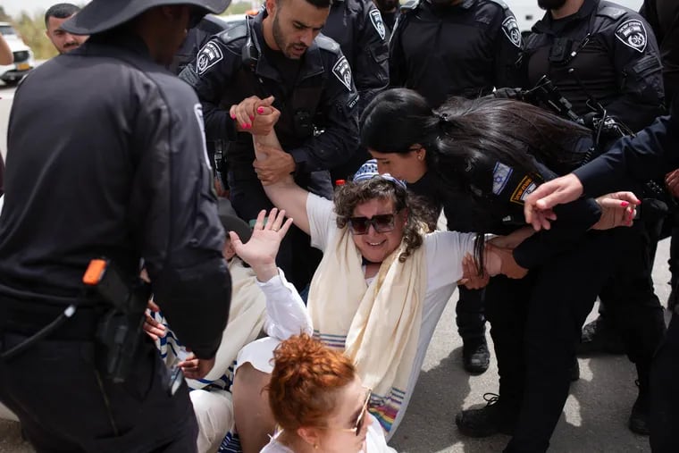 Rabbi Alissa Wise is arrested by police on April 26 as she and a group of religious leaders sought to deliver food to Gazans near the Erez border crossing in Israel.