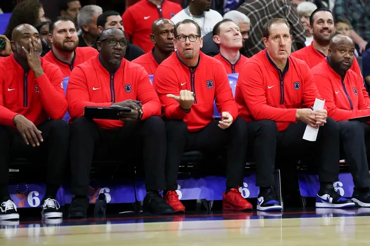 Bobby Jackson, second from left, is in his first season with Nick Nurse's Sixers coaching staff.