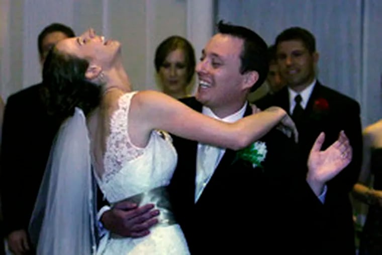 Melinda &quot;Lucky Lynnie&quot; and Paul share a laugh at the end of their first dance.