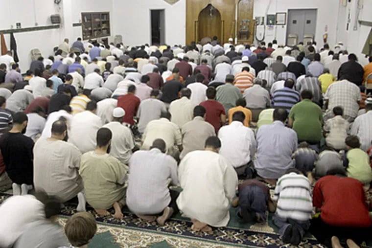 Members of the Al-Asqa mosque pray during Ramadan Sept. 4 in Philadelphia. (AP Photo/H. Rumph Jr)