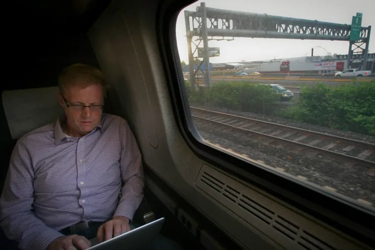 Brian Kieser of Philadelphia rides the Amtrak train out of 30th St. Station regularly for his finance job in NYC. (ALEJANDRO A. ALVAREZ / Staff Photographer)