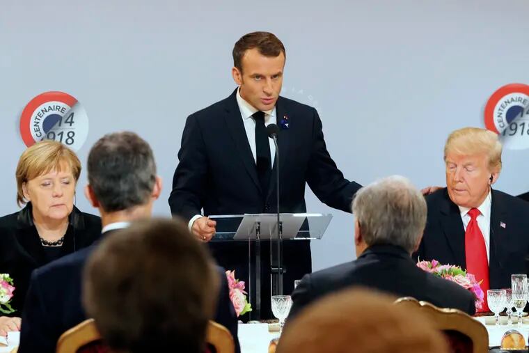 French President Emmanuel Macron speaks at the Elysee Palace in Paris to mark the 100th anniversary of the end of World War II.