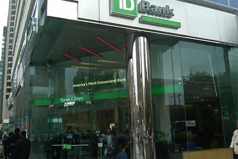 The TD Bank branch at 1500 JFK Boulevard in Center City was busy this evening. Problems resulting from a switch to a new computer system have rankled many customers. (Bob McGovern / Philly.com)