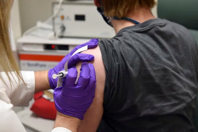 This May 4, 2020 photo provided by the University of Maryland School of Medicine shows the first patient enrolled in Pfizer's COVID-19 coronavirus vaccine clinical trial at the University of Maryland School of Medicine in Baltimore.