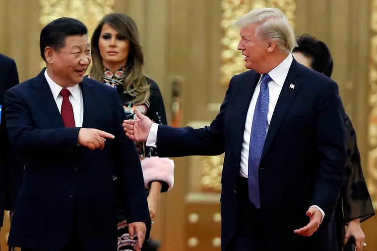President Trump China's President Xi Jinping arrive for the state dinner with the first ladies at the Great Hall of the People in Beijing, China.