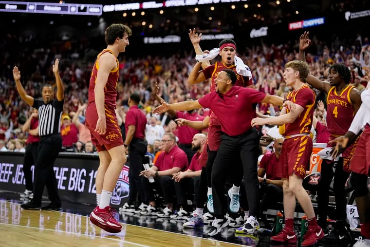 Milan Momcilovic #22 of the Iowa State Cyclones celebrates with the bench after scoring during the second half of the Big 12 Men's Basketball Tournament championship against the Houston Cougars game at T-Mobile Center on March 16, 2024 in Kansas City, Missouri.