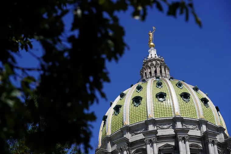 The Pennsylvania state Capitol in Harrisburg. Lack of retirement savings will cost Pennsylvania taxpayers more than $14 billion in increased state social services over 15 years, writes state Treasurer Stacy Garrity.
