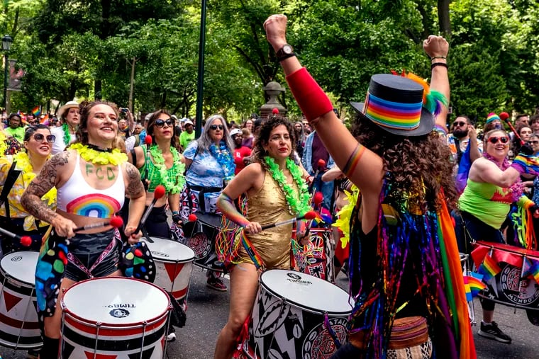 Drummers from Batala Philly, an all-percussion, community band that plays samba reggae music from Brazil, warm up the crowd before the march up Walnut Street as thousands of people celebrate queerness and the start of Pride Month at the Pride March and Festival in Center City on June 4, 2023.