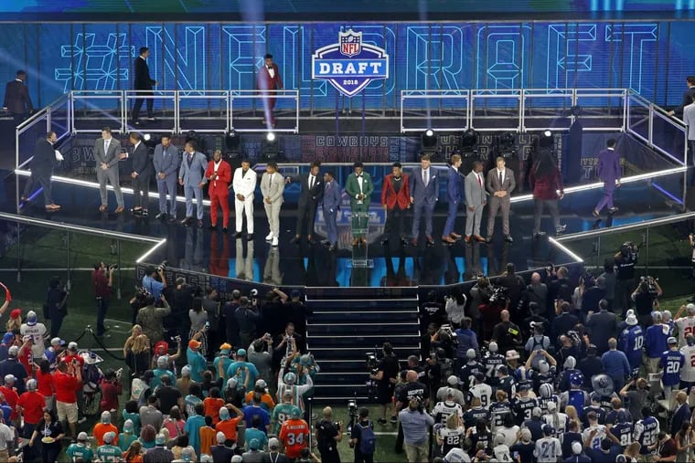 The first-round players onstage during their introduction as the NFL Draft begins at AT&amp;T Stadium in Arlington, Texas on Thursday.