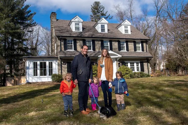 When they first moved in, the yard was so overgrown it could be hard to see the house, but Justin and Liza Bresson saw a great place to raise their children (from left) Hunter, Cindy and Cobe (and Bernedoodle Moshe).