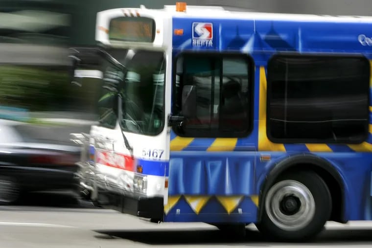 A SEPTA bus passes in front of City Hall near Market Street in Philadelphia on April 29, 2008. This image is an illustration for the economy story. .David Maialetti / Philadelphia Daily News.
