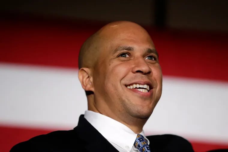 Sen. Cory Booker told Hillary Clinton volunteers that they would be taking their place in history alongside civil rights marchers and abolitionists.