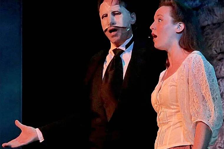 John D. Smitherman is the Phantom and Maggie Griffin-Smith is Christine in &quot;Phantom&quot; at the Broadway Theatre of Pitman.