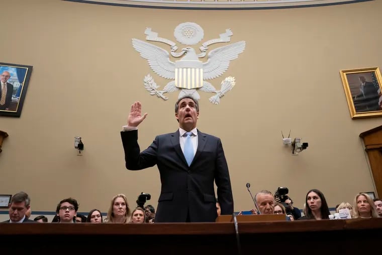 Michael Cohen, President Donald Trump's former personal lawyer, is sworn in to testify before the House Oversight and Reform Committee.
