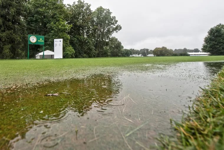 Rain falls near the 10th tee Sunday morning at the Aronimink Golf Club in Newtown Square, Pennsylvania. Sunday, September 9, 2018. The BMW Championship final round is delayed due to weather and course conditions, lots and gates remain closed until further notice.
