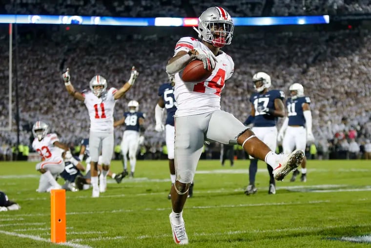 Ohio State wide receiver K.J. Hill Jr. (14), shown last year finishing a 24-yard touchdown during the fourth quarter against Penn State.