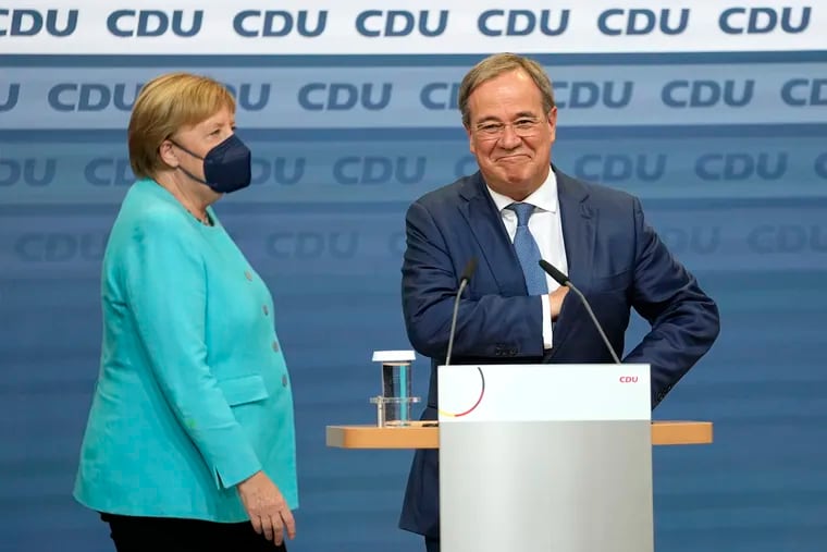 Chancellor Angela Merkel with Armin Laschet, her party’s candidate to succeed her, in Berlin on Sunday.