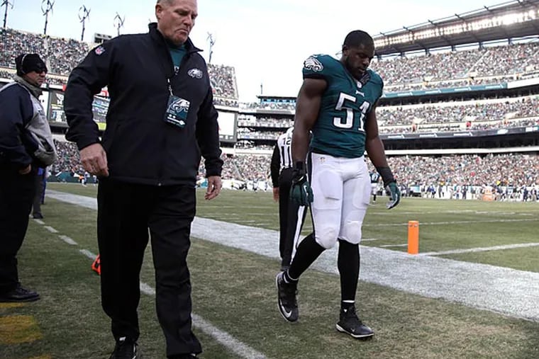 Philadelphia Eagles' Emmanuel Acho walks to the locker room during the
first half of an NFL football game against the Tennessee Titans, Sunday, Nov. 23, 2014, in Philadelphia. (Michael Perez/AP)