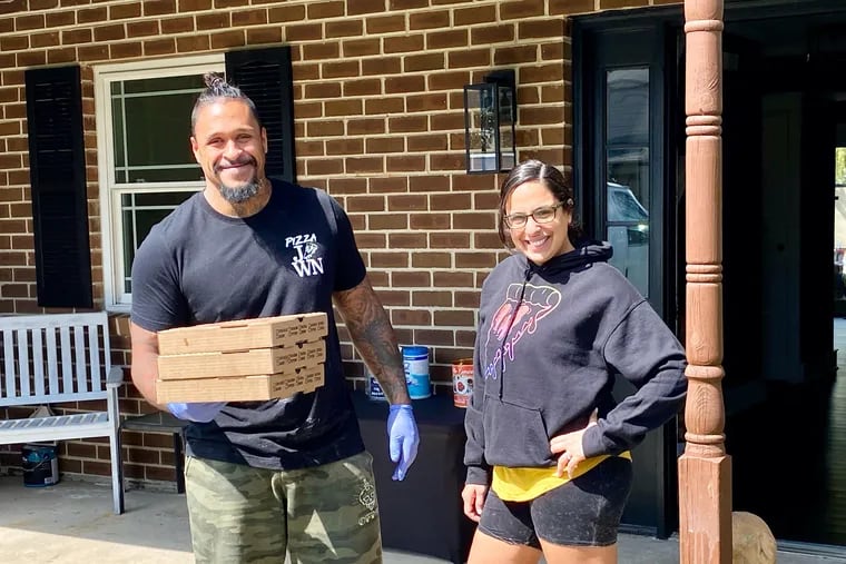 David and Ana Lee outside their home in April 2020, in the pandemic days of Pizza Jawn.