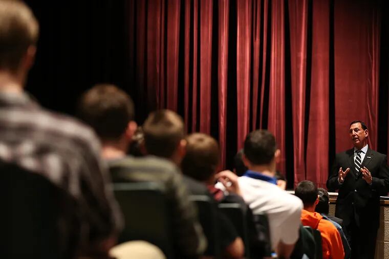 U.S. Congressman Frank LoBiondo, at right, talks with students at Clearview Regional High School in Mullica, NJ on February 9, 2015.  ( DAVID MAIALETTI / Staff Photographer )