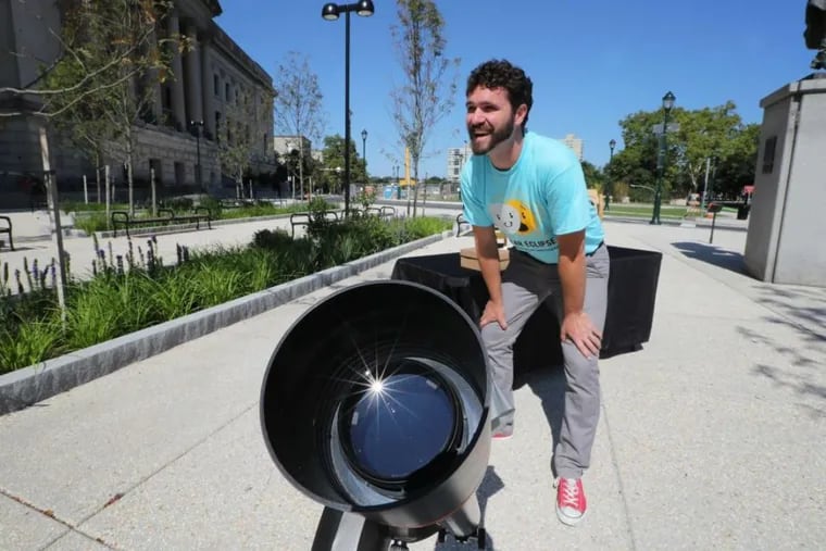 Expecting crowds for Monday’s solar eclipse, Mickey Maley, assistant director of public programs at the Franklin Institute, spent Sunday readying dozens of projection telescopes and Sun Spotters.