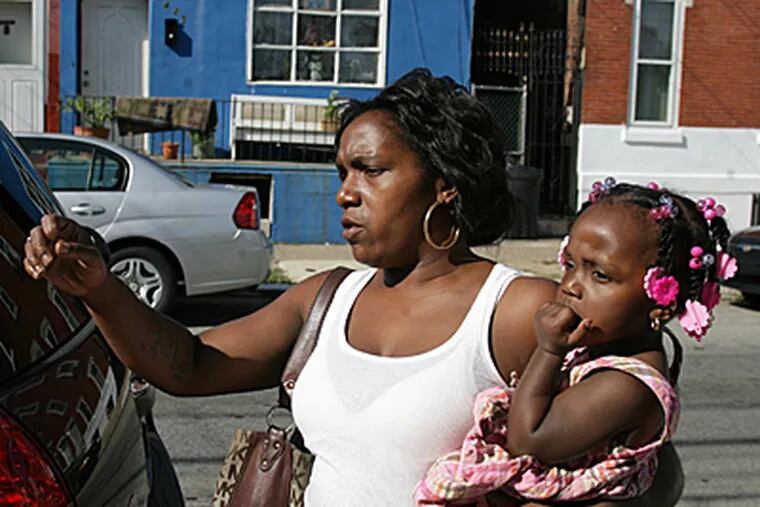Dionne Whitaker describes how she and her daughter, Adima Davis, were maced by police during a baby shower. (Yong Kim / Daily News)