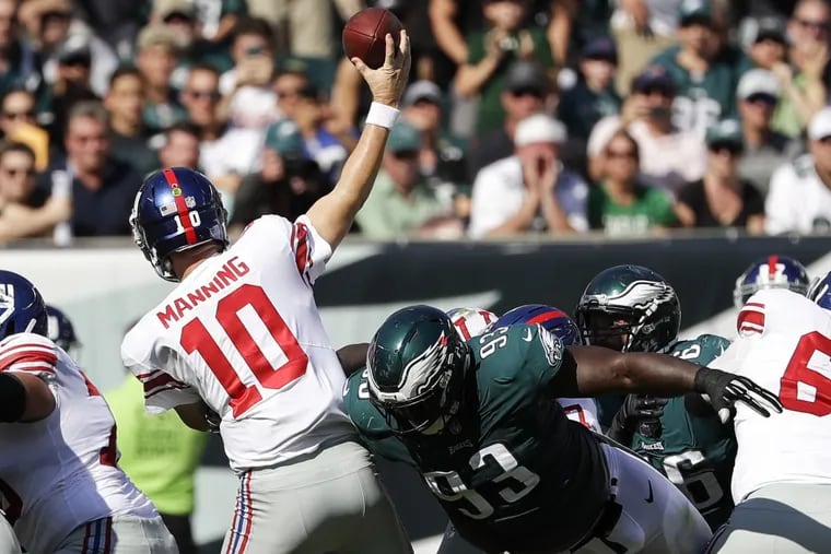 Eagles defensive tackle Tim Jernigan goes after Giants quarterback Eli Manning during the Eagles’ heart-stopping, last-second win over the Giants in Week 3. YONG KIM / Staff Photographer