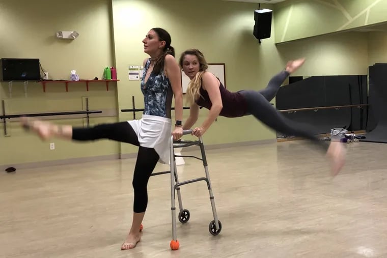 Danielle Bourgeon (left) and her dance partner Kayla Babicki use a wheelchair in a ballet choreographed by Bourgeon, who has Multiple Sclerosis.