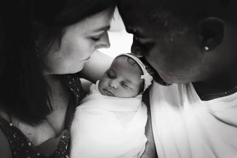 Rebecca and Dave with newborn Saoirse Rose.