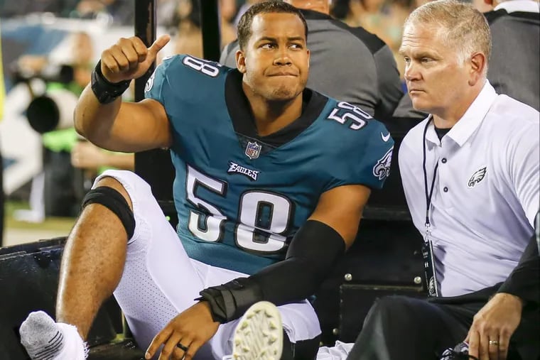 Eagles middle linebacker Jordan Hicks exits the game on a cart after injuring his ankle.