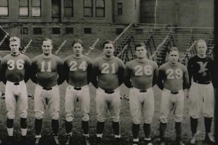 A portion of a team picture of the Eagles squad from the early 1930s, with coach Lud Wray at right. From 1933 to 1935, Wray compiled a record of nine wins, 21 losses, and a tie.