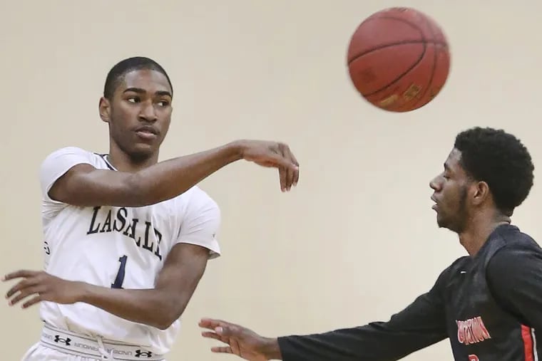 La Salle's Allen Powell (left), shown in action against Constitution in 2017, is waiting for his first college scholarship offer.